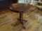 (BAS) ROUND HIGH TOP TABLE WITH PEDESTAL BASE AND CLAW CARVED FEET. MEASURES 42 IN X 42 IN. ITEM IS
