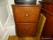 (BAS) MAHOGANY 2 DRAWER FILING CABINET WITH METAL PULLS. MEASURES 18 IN X 18 IN X 29 IN. ITEM IS