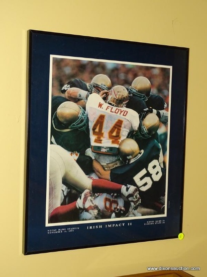 (BAS) FRAMED NOTRE DAME PHOTOGRAPH TITLED "IRISH IMPACT II". IS IN A BLACK FRAME AND MEASURES 18 IN