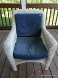 (BCK PRCH) WHITE WICKER ARM CHAIR WITH BLUE CUSHION BACK & SEAT. MEASURES 30 IN X 35 IN X 36 IN.
