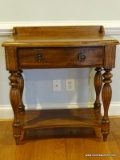 (BED 1) HARDEN FURNITURE CO. 1 DRAWER AND 1 SHELF SIDE TABLE WITH GALLERY BACK AND CARVED LEGS.