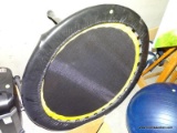 (FURN) MINI TRAMPOLINE IN BLACK, YELLOW, AND SILVER. MEASURES 36 IN X 9 IN. ITEM IS SOLD AS IS WHERE