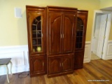 (BAS) 3 SECTION ENTERTAINMENT CENTER WITH 2 GLASS PANELED DOORS ON EITHER SIDE THAT OPEN TO REVEAL 3