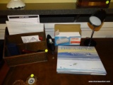 (BAS) DESK ORGANIZER WITH 4 LETTER FILING AREAS. MEASURES 12 IN X 9 IN X 9.5 IN. ITEM IS SOLD AS IS