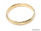 14K YELLOW GOLD BANGLE BRACELET. MARKED ON THE INSIDE. WEIGHS APPROX. 13.80 GRAMS.