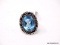 GERMAN SILVER & BLUE TOPAZ GEMSTONE RING. THE RING SIZE IS 6.