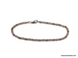 .925 STERLING SILVER & GOLD VERMEIL ROPE TWIST BRACELET. MARKED ON THE CLASP. WEIGHS APPROX. 5.43