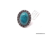 GERMAN SILVER & TURQUOISE GEMSTONE RING. THE RING SIZE IS 7.