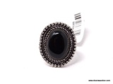 GERMAN SILVER & BLACK ONYX GEMSTONE RING. THE RING SIZE IS 7.
