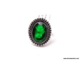 GERMAN SILVER & GREEN EMERALD RING. THE RING SIZE IS 8.