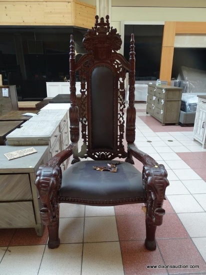 HIGHLY ORNATE AND HEAVILY CARVED THRONE STYLE CHAIR WITH ACANTHUS LEAF ACCENTS, AN EAGLE CARVED COAT