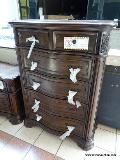 5 DRAWER AND LIFT TOP TALL CHEST WITH SCROLL CARVINGS FROM THE ROYALE COLLECTION BY STEVE SILVER.