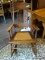 VINTAGE PRESSED AND SPINDLE BACK CANE BOTTOM ROCKING ARMCHAIR. MEASURES 26 IN X 34 IN X 42 IN. ITEM