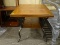 OAK AND METAL END TABLE WITH 1 LOWER SHELF. IS 1 OF A PAIR. MEASURES 24 IN X 28 IN X 22.5 IN. ITEM
