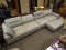 MODERN 4 PERSON SOFA WITH OTTOMAN. INCLUDES A MATCHING ACCENT PILLOW. SOFA MEASURES 152 IN X 43 IN X