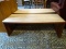 DOVETAILED CYPRESS WOOD AND ROSEWOOD COFFEE TABLE. IS 1 OF A PAIR AND MEASURES 48 IN X 22 IN X 18