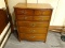 MAHOGANY 5 DRAWER CHEST WITH BRASS PULLS. MEASURES 36 IN X 19 IN X 46 IN. ITEM IS SOLD AS IS WHERE