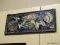STAINED GLASS WINDOW HANGER WITH A SEASHELL THEME. MEASURES 24 IN X 10 IN. ITEM IS SOLD AS IS WHERE