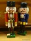 LOT OF 2 VINTAGE HAND PAINTED NUTCRACKERS. BOTH ARE SOLDIERS. TALLEST MEASURES 11 IN TALL. 1 NEEDS A