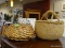 2 PIECE BASKET LOT TO INCLUDE A WICKER BASKET WITH METAL HANDLE AND A HAND WOVEN BASKET WITH