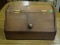 PINE BREAD BOX WITH BRASS KNOB STYLE HANDLE. MEASURES 20.5 IN X 12 IN X 12 IN. ITEM IS SOLD AS IS