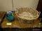 2 PIECE LOT TO INCLUDE AN ART GLASS LAMP, AND A HAND WOVEN 2 HANDLED BASKET. ITEM IS SOLD AS IS