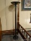 SILVER TONE TORCHIERE LAMP WITH ROUND BASE. MEASURES 72 IN TALL. ITEM IS SOLD AS IS WHERE IS WITH NO