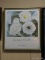 GEORGIA O'KEEFFE FRAMED PRINT OF WHITE FLOWERS IN A GREEN FRAME. MEASURE 30 IN X 34 IN. ITEM IS SOLD