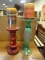 LOT OF 2 CANDLE HOLDERS. 1 IS CLEAR GLASS AND 1 IS RED PAINTED WOOD. BOTH INCLUDE A CANDLE. TALLEST
