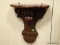 PAIR OF WALL HANGING CARVED MAHOGANY SHELVES. EACH MEASURES 14 IN X 16 IN. ITEM IS SOLD AS IS WHERE