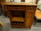 MAHOGANY BAR WITH 2 UPPER DRAWERS, 1 LOWER SIDE DOOR, CENTER STORAGE AREA, AND 2 LOWER WINE BOTTLE