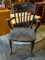 ANTIQUE OAK ARM CHAIR WITH SLAT BACK AND PLANK BOTTOM SEAT. MEASURES 26 IN X 19 IN X 37.5 IN. ITEM