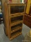 CHERRY 4 DOOR BARRISTER BOOKCASE WITH WOODEN KNOB STYLE HANDLES AND GLASS PANELED FRONTS. MEASURES