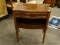MAHOGANY AND TOOLED LEATHER TOP END TABLE WITH 1 DRAWER OVER A LOWER SHELVING AREA AND REEDED COLUMN