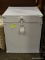 WHITE PAINTED SQUARE TRUNK WITH 2 HANDLES (1 ON EITHER SIDE) AND A LOCKABLE LATCH. MEASURES 18 IN X