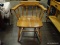MAPLE CAPTAINS CHAIR WITH SPINDLE BACK AND ARM SUPPORTS AS WELL AS TURNED LEGS AND A PLANK BOTTOM