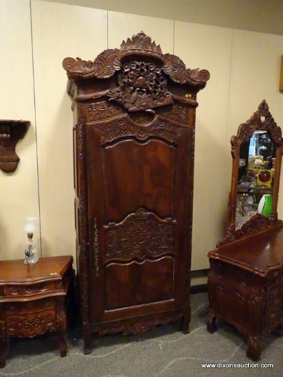 SOLID MAHOGANY HIGHLY CARVED WARDROBE WITH 1 DOOR THAT OPENS TO REVEAL AN INTERIOR SHELF AND 2