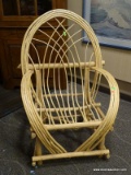 BENTWOOD AND TWIG ARM CHAIR. MEASURES 34 IN X 26 IN X 47 IN. ITEM IS SOLD AS IS WHERE IS WITH NO