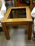 PINE END TABLE WITH SPACE FOR A GLASS INSERT. MEASURES 23 IN X 29 IN X 21 IN. ITEM IS SOLD AS IS