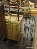 CAST IRON TRELLIS WITH LEAF AND GEOMETRIC PATTERN. MEASURES 18 IN X 40 IN. ITEM IS SOLD AS IS WHERE