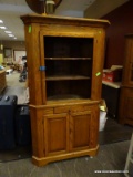 ANTIQUE OAK 2 PIECE CORNER CABINET WITH 2 INTERIOR WOODEN SHELVES, A SINGLE CENTER DRAWER, AND 2