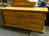 BROYHILL PINE MIRRORED 7 DRAWER AND 1 DOOR DRESSER. MEASURES APPROXIMATELY 70 IN X 19 IN X 80.5 IN.