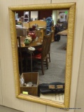 DIXIE FURNITURE CO. FRAMED MIRROR WITH WICKER STYLE FRAME. MEASURES 25.5 IN X 42.5 IN. ITEM IS SOLD