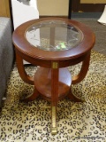 OVAL MAHOGANY END TABLE WITH CUT GLASS CENTER, BANDED TOP, REEDED LEGS WITH BRASS ACCENTS, AND A