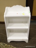 WHITE PAINTED 3 SHELF WHATNOT SHELVING UNIT. MEASURES 18 IN X 10 IN X 31 IN. ITEM IS SOLD AS IS