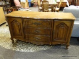 PECAN FINISH 3 DRAWER AND 2 DOOR BUFFET WITH BRASS HANDLES (1 IS BROKEN), SHELL CARVED SKIRT, AND