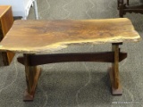 CYPRESS WOOD COFFEE TABLE WITH PEG CONSTRUCTION. MEASURES 37 IN X 22 IN X 17.5 IN. ITEM IS SOLD AS