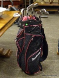 SET OF 10 WILSON GOLF CLUBS WITH A PINK AND BLACK GOLF CLUB CARRYING BAG. ITEM IS SOLD AS IS WHERE