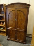 MAHOGANY GENTLEMAN'S ARMOIRE WITH A BOW CREST, 2 UPPER DOORS THAT OPEN TO REVEAL INTERIOR STORAGE