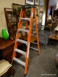 HUSKY 6 FT FOLDING LADDER IN ORANGE AND SILVER. ITEM IS SOLD AS IS WHERE IS WITH NO GUARANTEES OR